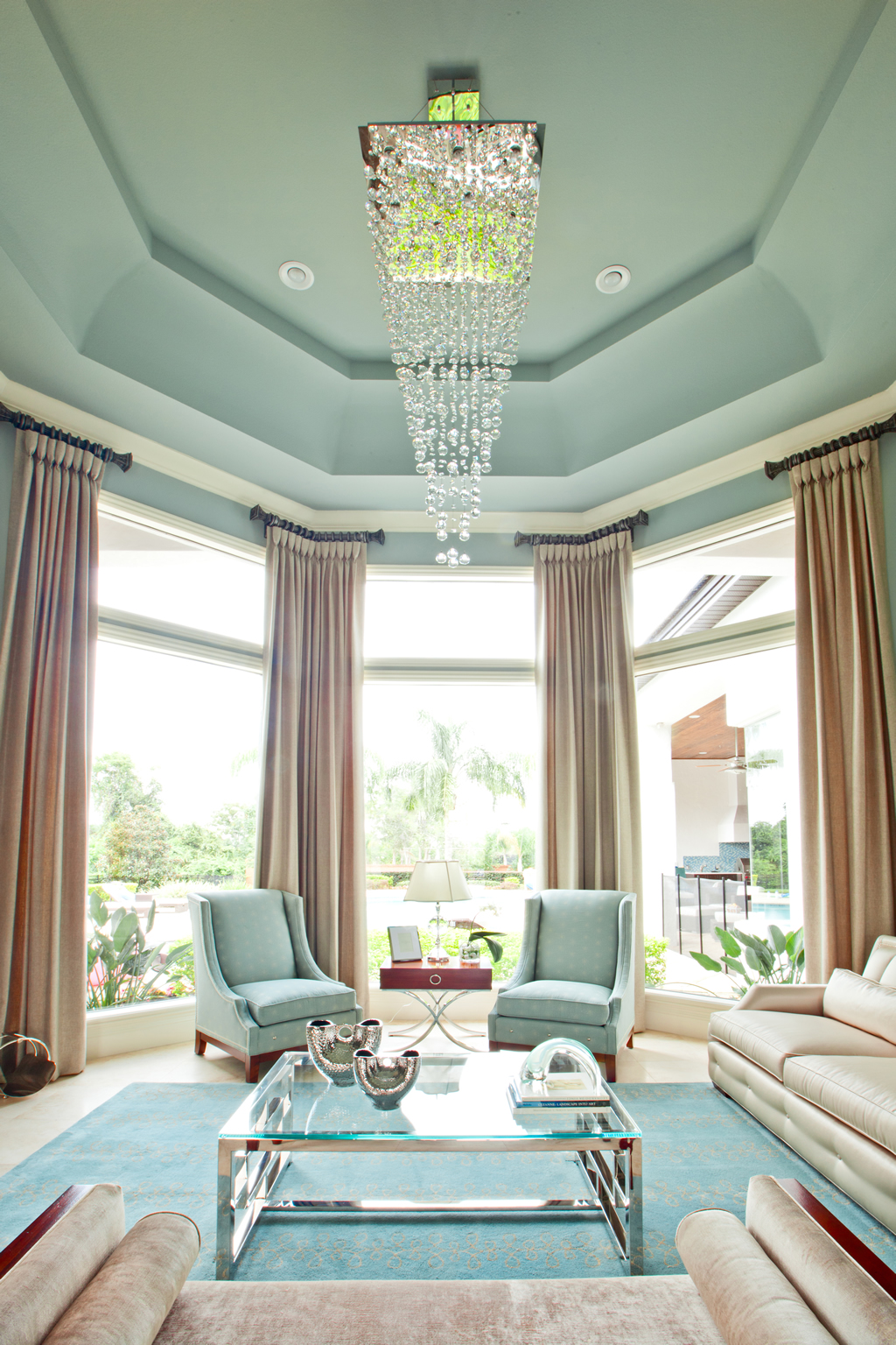 Chic furnished living room with chandelier