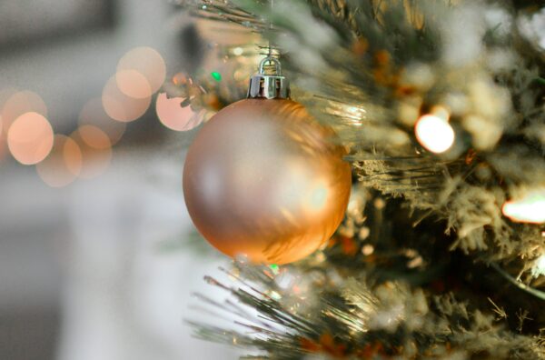Gold ornament on Christmas treet