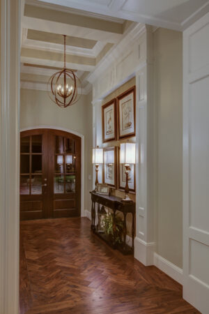 Entryway with french doors and chandelier